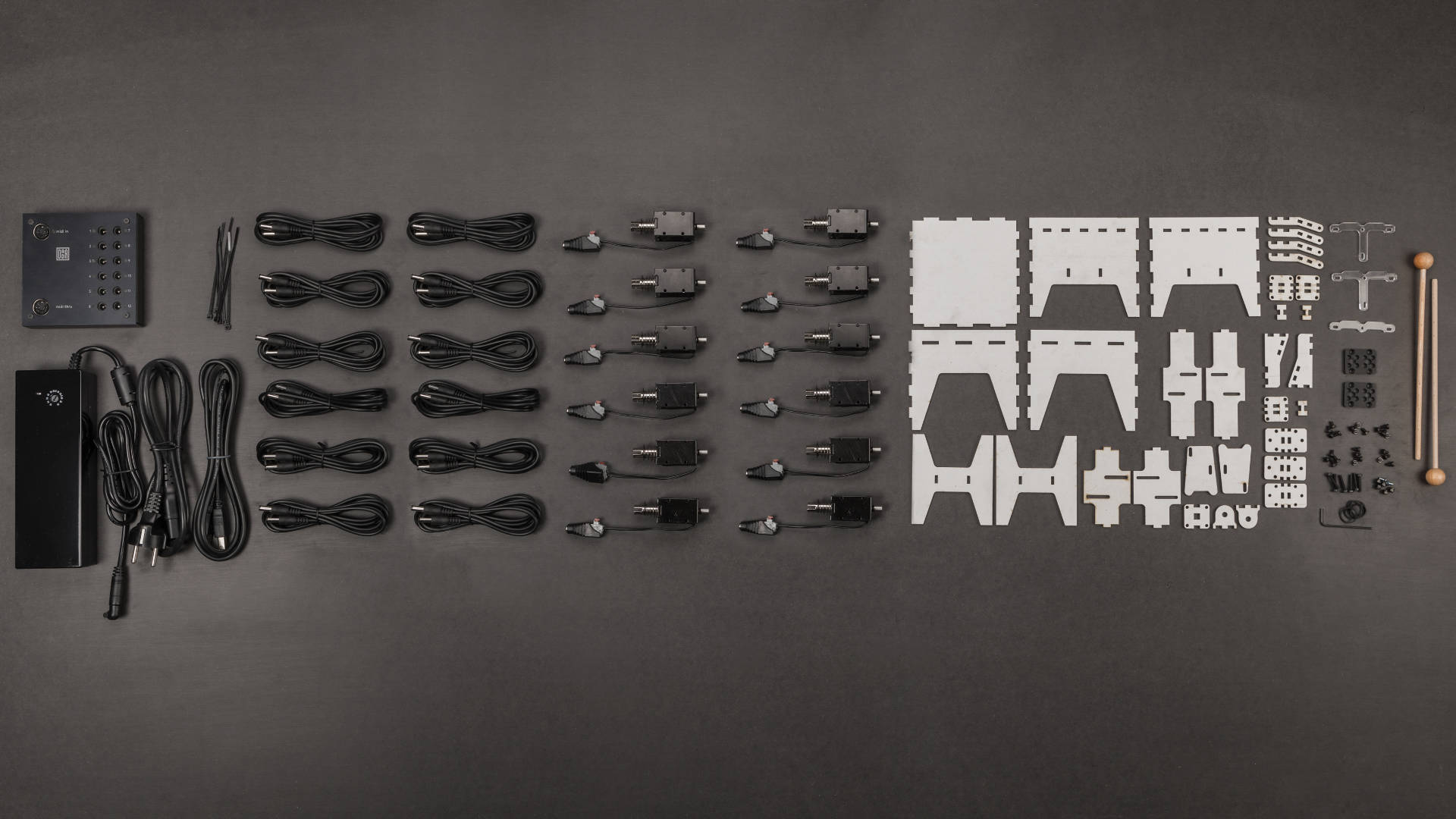 Automat toolkit laid out with controller, solenoid beaters and accessories